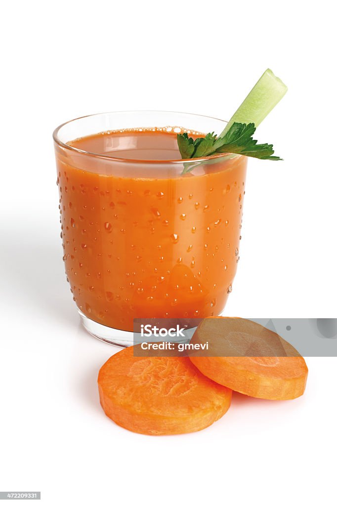 juice glass with carrot juice on white background Breakfast Stock Photo