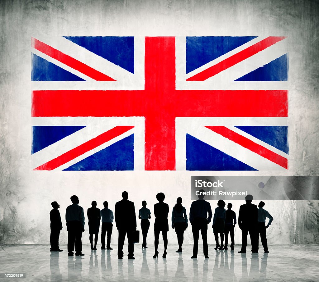 Деловые люди, стоя перед союз флаг - Стоковые фото Английский флаг роялти-фри