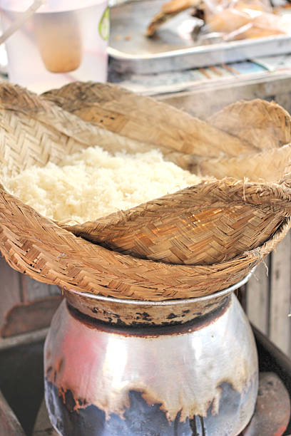istock making steamed sticky rice in pot 472211004