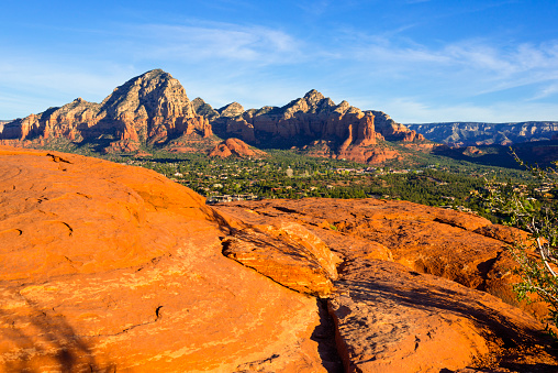 View to Sedona during sunrise with red rocks in the background and in the foreground. View from Sedona airport vortex.