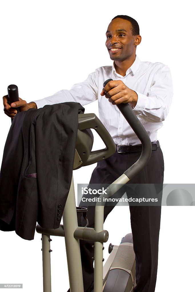 Young Black Businessman Working Out in a Corporate Gym Young black businessman working out after office hours Active Lifestyle Stock Photo