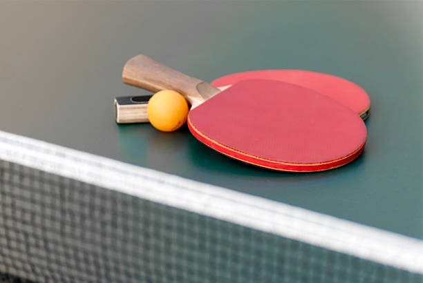 istock two tennis racket and a ball 472214989