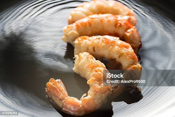 Fried Shrimps On The Black Background Stock Photo - Download Image Now - 2015, Acid, Appetizer