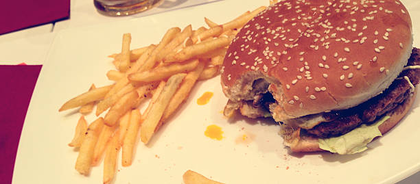 istock hamburger with french fries chips 472218495