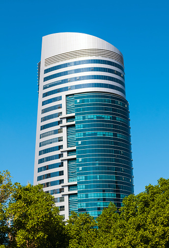 SHARJAH, UAE - DECEMBER, 10, 2013: General view of modern building in Sharjah. It is the most industrialized emirate in UAE. 