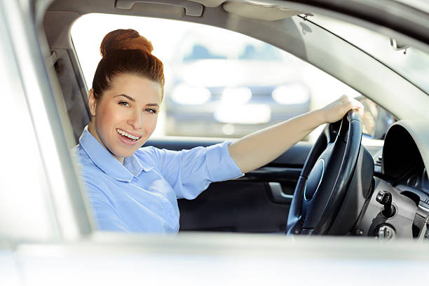 istock happy driver woman 472220023
