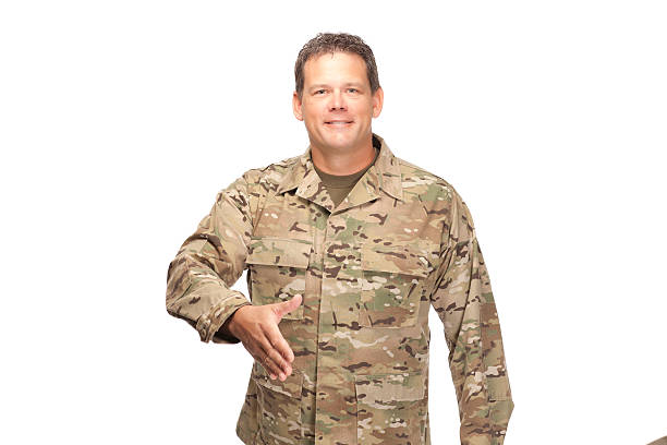 istock U.S. Army Soldier, Sergeant. Isolated and shaking hand. 472220690