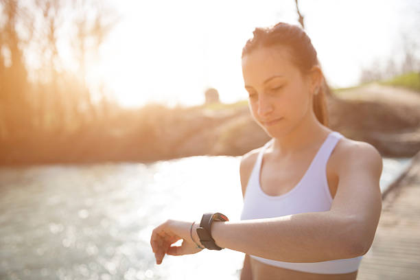 istock Young woman jogging 472223301