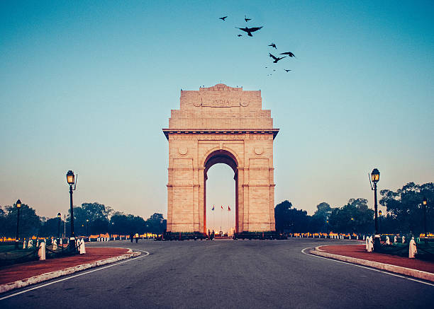 India Gate New Delhi Sunrise at India Gate. New Delhi. triumphal arch photos stock pictures, royalty-free photos & images