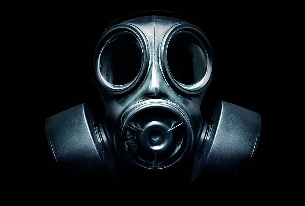 Gas Mask A black military gas mask for protection gas mask stock pictures, royalty-free photos & images