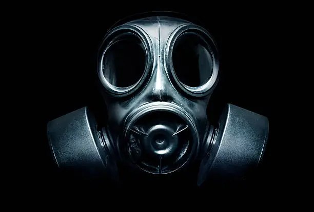 A black military gas mask for protection