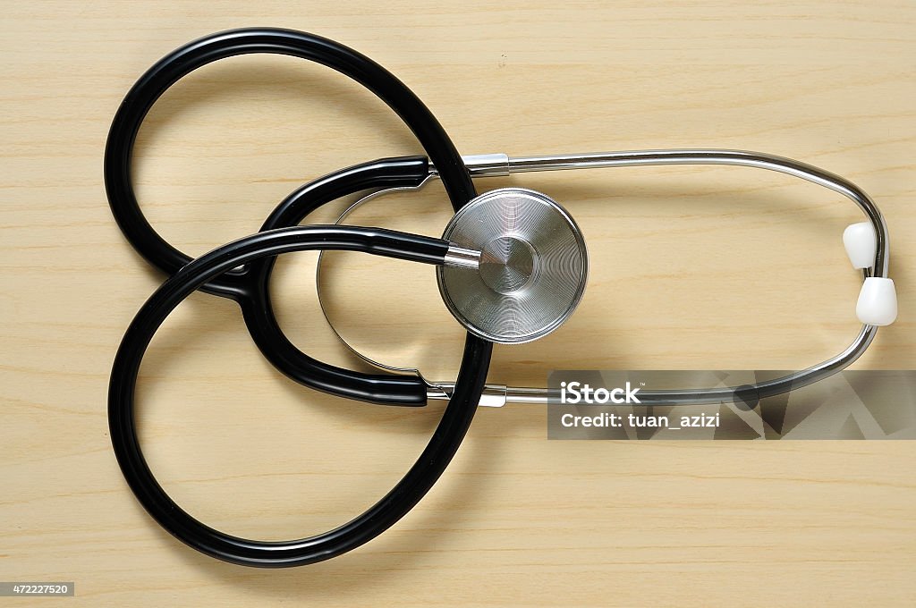 Stethoscope On Table, Selective Focus Image Of Stethoscope On Table, Selective Focus Obsessive Stock Photo