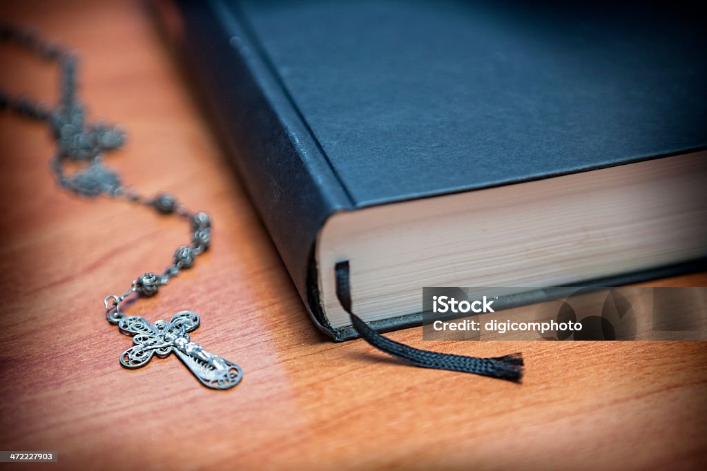 Rosary beads and a holy bible Bible Stock Photo