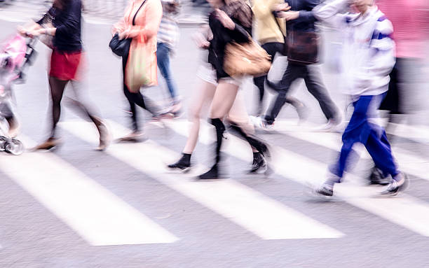 istock People walking on big city street 472228951