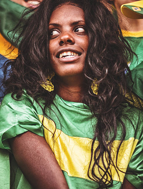 istock pretty brazilian supporter at stadium 472230941