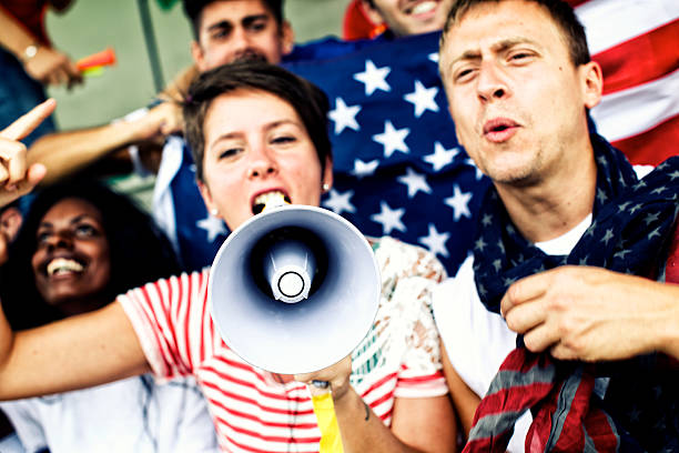 istock Sports fans cheering a game 472230947