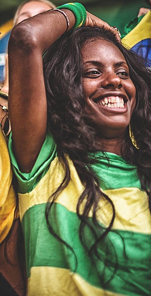 istock pretty brazilian supporter at stadium 472230949