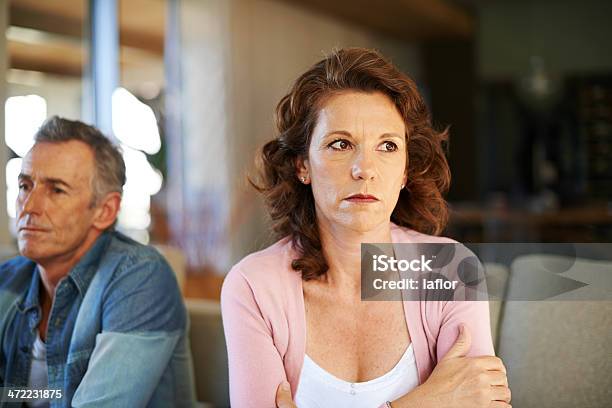 Isolated In Her Marriage Stock Photo - Download Image Now - Couple - Relationship, 50-59 Years, Displeased