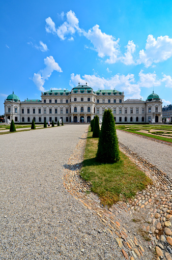 Vienna, Austria - July 6, 2012: Tourists strolling in the gardens of Belvedere, constructed for Prince Eugene of Savoy by J.L. von Hildebrandt.