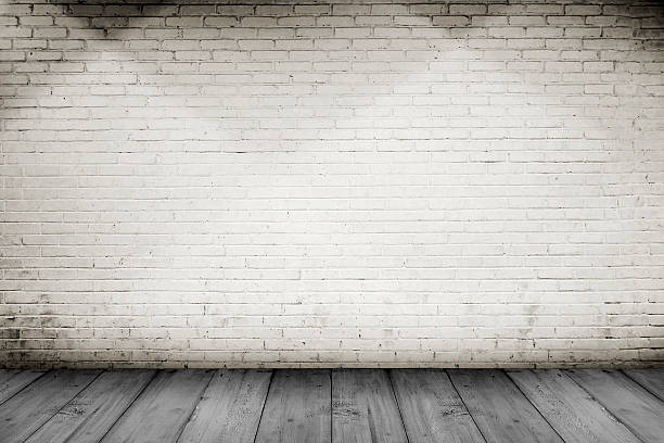 istock Wooden floor and brick wall background 472232792
