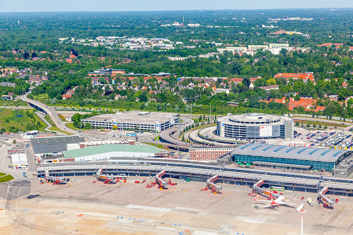 Hamburg, Germany  - May 24, 2012: aerial of Aircraft at the gate in Terminal 2 in Hamburg, Germany. Terminal 2 was completed in 1993 and houses Lufthansa and other Star Alliance partners.