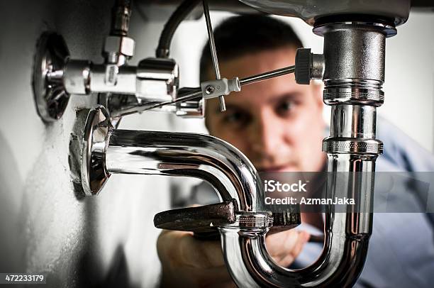 Plumber Repairing Sink Stock Photo - Download Image Now - Below, DIY, Sink
