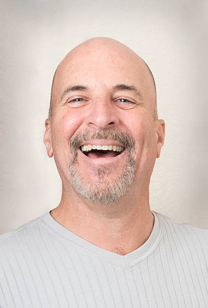 istock Portrait of a Mature laughing Man 472234349