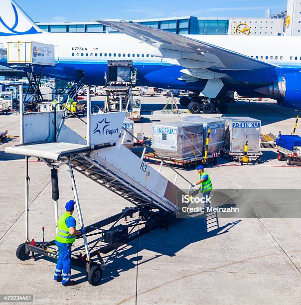 People With Air Bridge And United Aircraft Standing At Terminal Stock Photo - Download Image Now