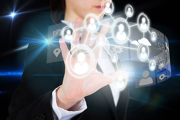 istock Businesswoman touching interface with profile pictures 472234753