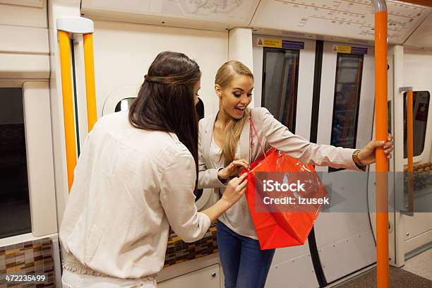 Friends In Subway Stock Photo - Download Image Now - Shopping Bag, Train - Vehicle, Women