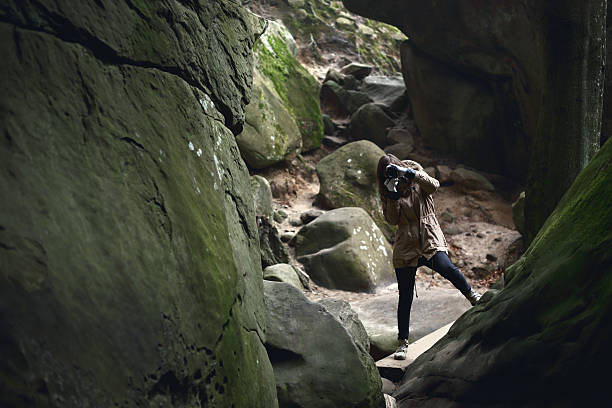 istock Photographer in the rocky mountains 472236085