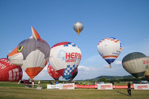 Hummeltal, Germany – July 25, 2014: ballooning festival named Montgolfiade with hot air balloons