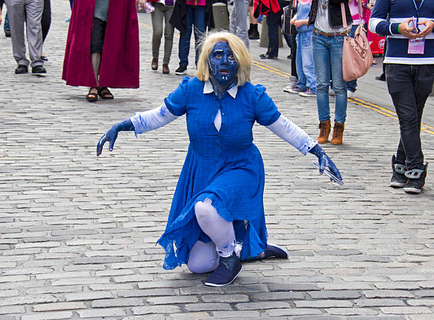 Edinburgh, UK: August 2, 2012: Actress plays a zombie in the street at the Edinburgh Festival Fringe in Edinburgh, UK on August 2, 2012