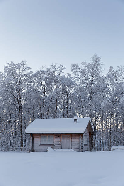 istock isolated wooden hut in remote arctic winter scene 472240478