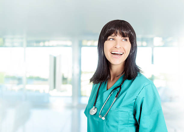 istock doctor woman laughing 472241383
