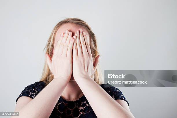 Woman Hiding Her Face Stock Photo - Download Image Now - Adult, Adults Only, Anxiety