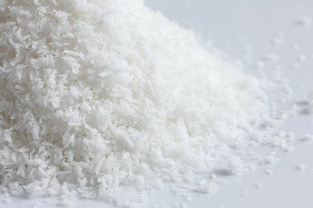 istock Abstract detail of dessicated coconut. Selective focus. 472243912