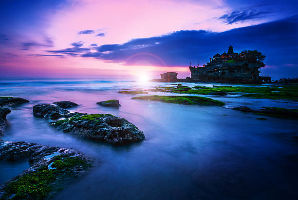 BALI Landmark Tanah Lot temple in sunset. Bali island, indonesia BALI Landmark Tanah Lot temple in sunset. Bali island, indonesia tanah lot sunset stock pictures, royalty-free photos & images