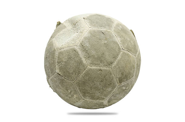 istock Old football isolated on white 472251510