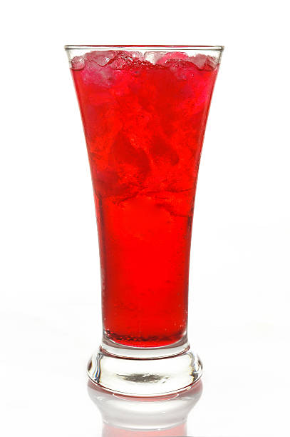 istock Glass of Red Soda isolated on white background 472257192