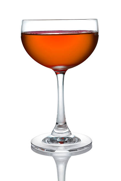 istock Glass of orange cocktails color isolate on white background 472257202