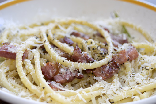 Italian speciality: the gricia, a type of amatriciana with fried oil bacon and pecorino