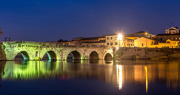 istock Twilight. Evening light on historical Tiberius bridge. Rimini 472261190