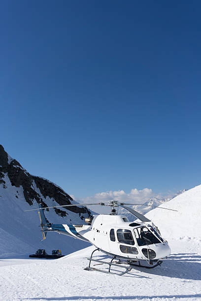 istock White rescue helicopter parked in the mountains 472263094