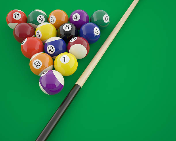 istock Billiard balls with cue on a green table 472265414