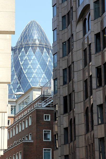 istock The Gherkin enframed by surrounding buildings 472266714
