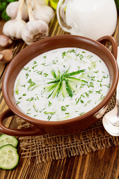 istock Summer soup with cucumbers, yogurt and fresh herbs 472269564