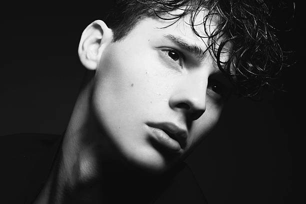 istock Portrait of handsome young man 472273550