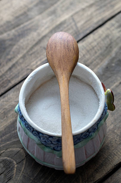 istock sugar bowl with a wooden spoon 472276958