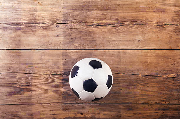 istock Soccer ball on the floor 472277002
